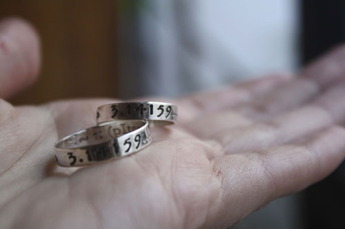 Alliances PI, bague personnalisée symboles d’infini en argent