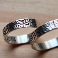 Diapason, alliances, bague symbole polynésien en argent