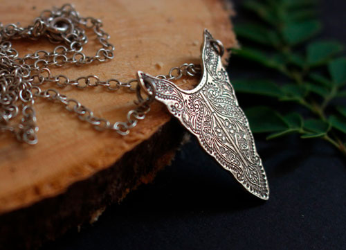 Plénitude, collier tête de bison en argent