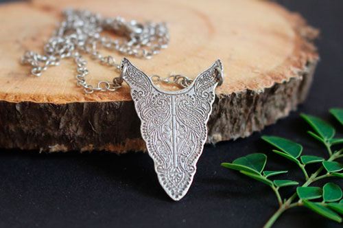 Plénitude, collier tête de bison en argent