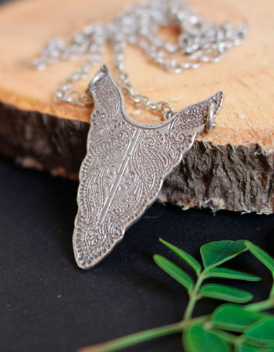 Plénitude, collier tête de bison en argent