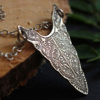 Plénitude, collier tête de bison en argent