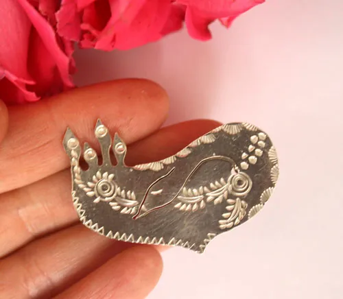 Alicanto, broche oiseau des Andes en argent