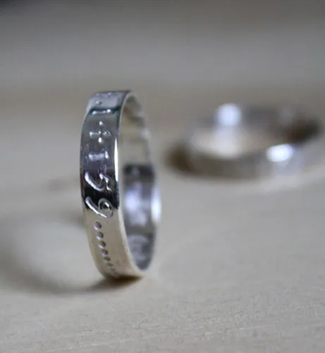 Alliances PI, bague symbole d’infini en argent