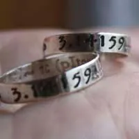 Alliances PI, bague symbole d’infini en argent
