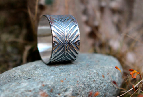 Boomerang, bague chevron et flèche en argent