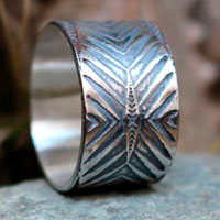 Boomerang, bague chevron et flèche en argent