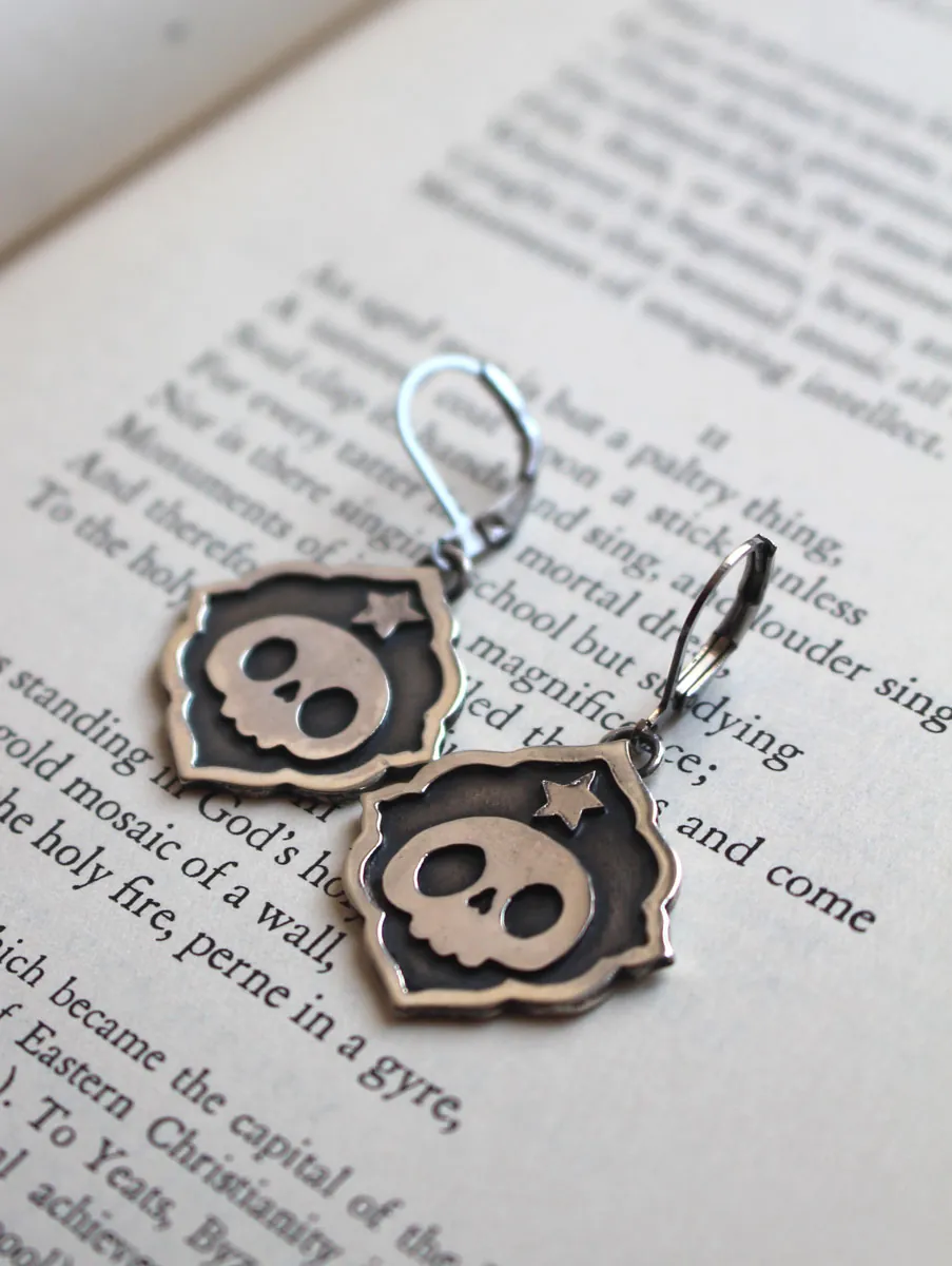 Calaverita, boucles d’oreilles crâne et étoile de tradition mexicaine en argent