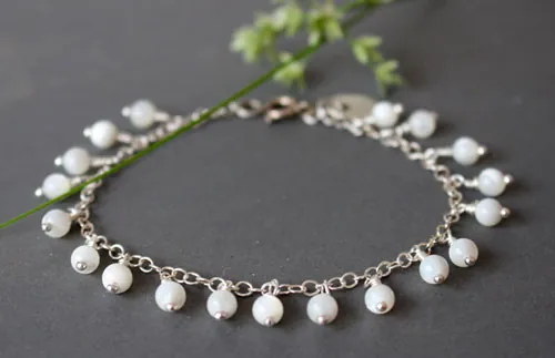 Cosmos, bracelet fleur de l’innocence en argent et nacre