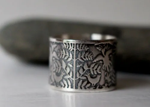D’air et d’eau, bague poisson et oiseau otomi en argent