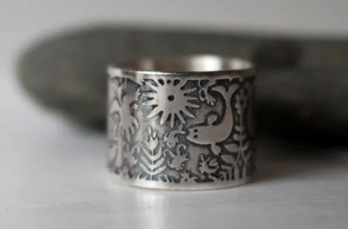 D’air et d’eau, bague poisson et oiseau otomi en argent