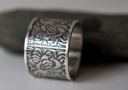 D’air et d’eau, bague poisson et oiseau otomi en argent