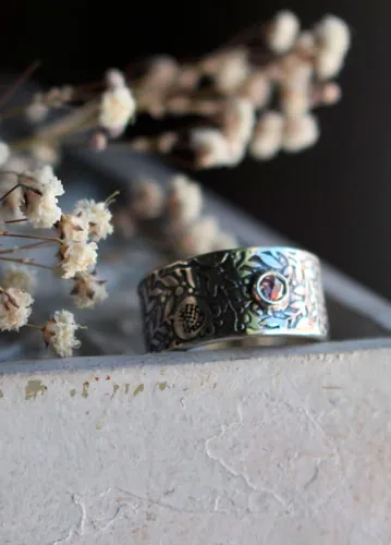 Eternité, bague grenade en argent et diamant