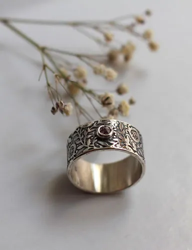 Eternité, bague grenade en argent et diamant