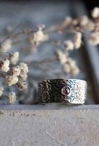 Eternité, bague grenade en argent et diamant