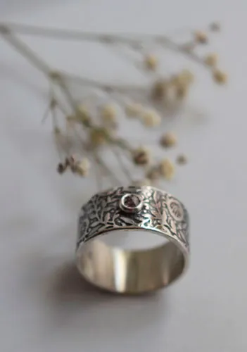 Eternité, bague grenade en argent et diamant