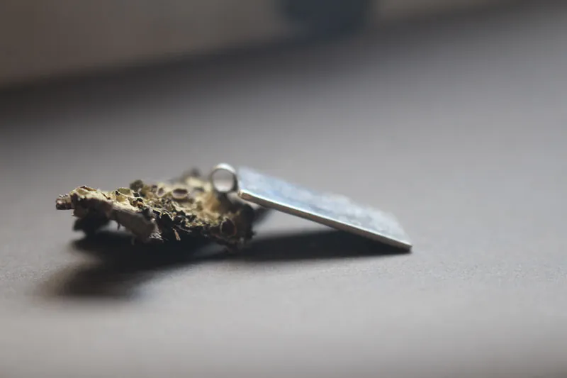 Feu sacré, collier glyphe aztèque mexicain en argent