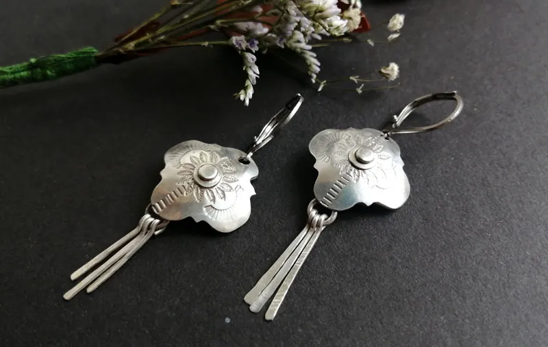 Halo, boucles d’oreilles étoile baroque en argent