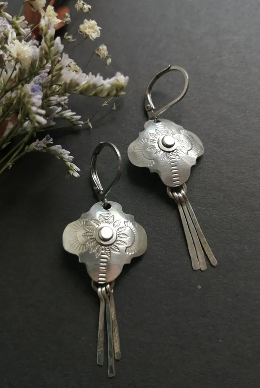 Halo, boucles d’oreilles étoile baroque en argent