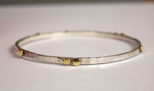 Hélios, bracelet soleil en argent massif et laiton