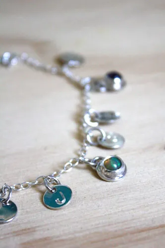 L’arbre de Jessé, bracelet souvenir de famille en argent améthyste, opale et péridot