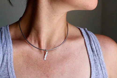 Le petit prince, pendentif silhouette du conte de Saint-Exupéry en argent