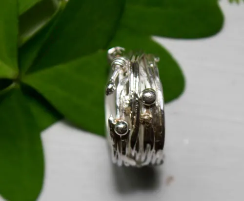 Les racines du hasard, bague tissage du fil de la vie grec en argent