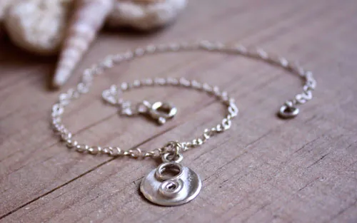 Lina, chaîne de cheville et bracelet spirale et cercle de l’infini en argent