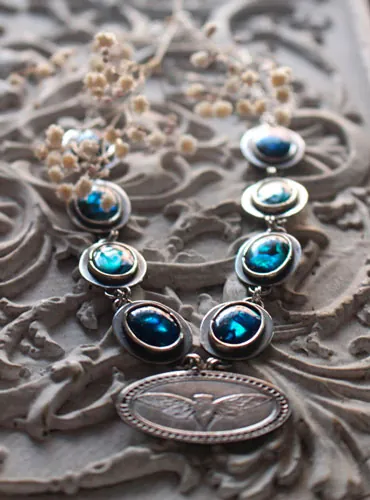 Lysandra, collier papillon Maori en argent et paua