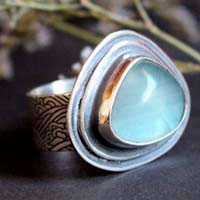 Le bleu des vagues, bague mouvement de la mer en argent et fluorite