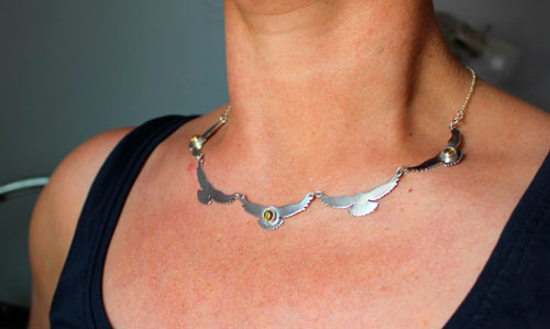 Le chant du soleil, collier oiseaux en argent et zircon jaune