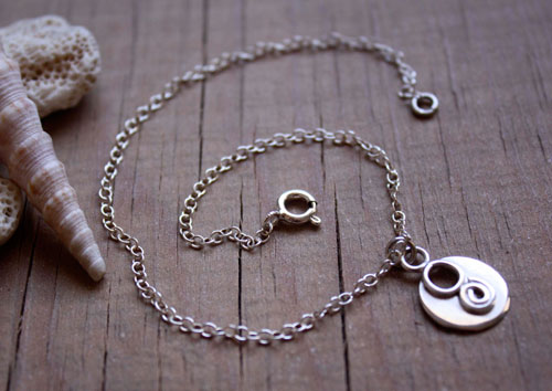 Lina, chaîne de cheville et bracelet spirale et cercle de l’infini en argent