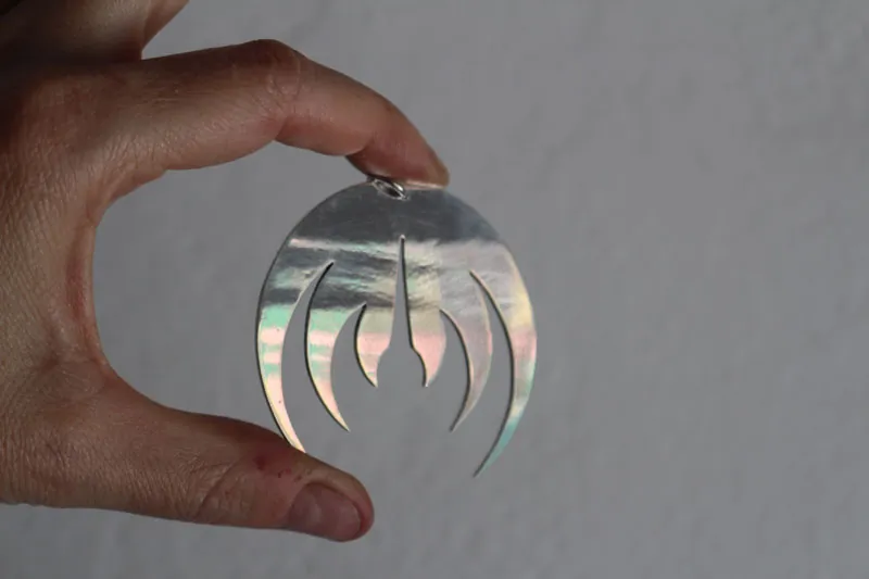 Magma deluxe, pendentif logo de groupe de rock en argent