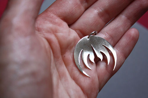 Magma, pendentif logo de groupe de rock en argent