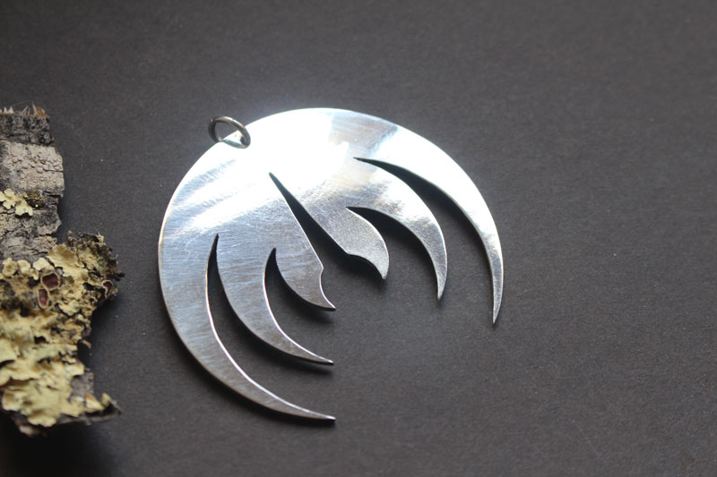 Magma deluxe, pendentif logo de groupe de rock en argent