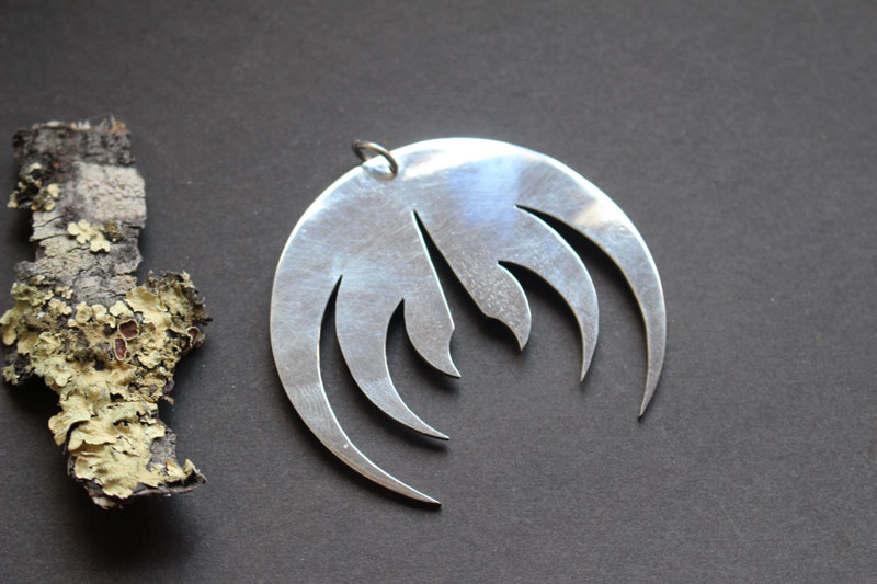 Magma deluxe, pendentif logo de groupe de rock en argent