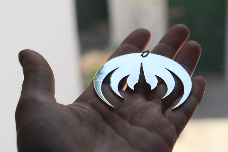 Magma deluxe, pendentif logo de groupe de rock en argent