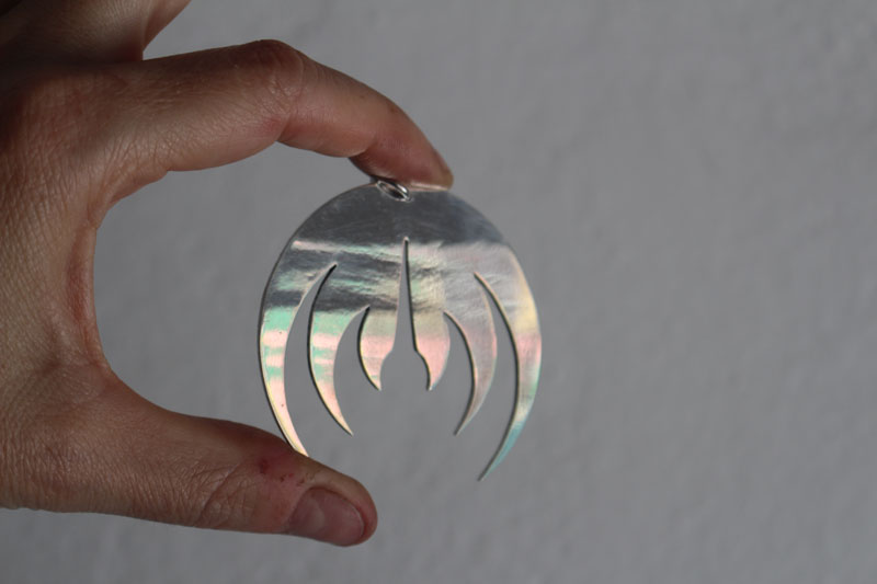 Magma deluxe, pendentif logo de groupe de rock en argent