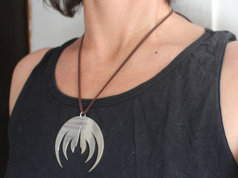 Magma deluxe, pendentif logo de groupe de rock en argent