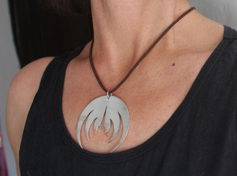 Magma deluxe, pendentif logo de groupe de rock en argent