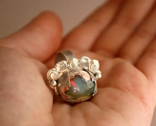 Nébuleuse, bague astronomie en argent et opale de feu