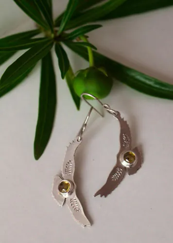 Ode au soleil, boucles d’oreilles aigle amérindien en argent et zircon jaune