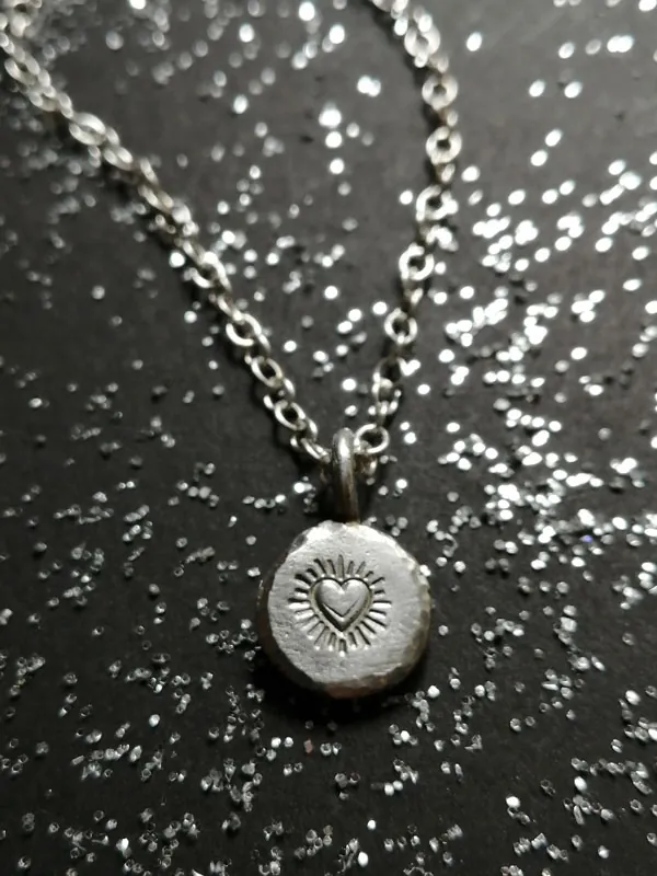 Promesse, collier cœur passionné en argent