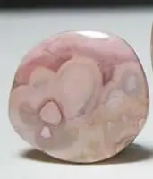 Rhodochrosite d  cabochon
