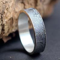 Portail du temps, bague stèle néolithique de Gavrinis en argent