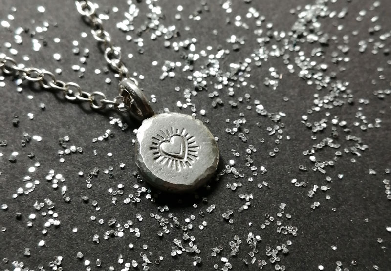 Promesse, collier cœur passionné en argent