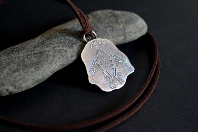 Rituel aborigène Kiro Kiro, collier art rupestre australien en argent