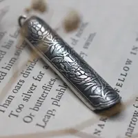 Scarabée et protea, pendentif botanique en argent