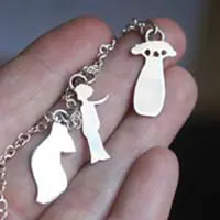 Tes souvenirs, bracelet symboles du petit prince en argent