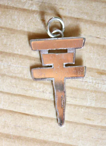 Tokio Hotel, pendentif logo de la croix du groupe pop rock en argent